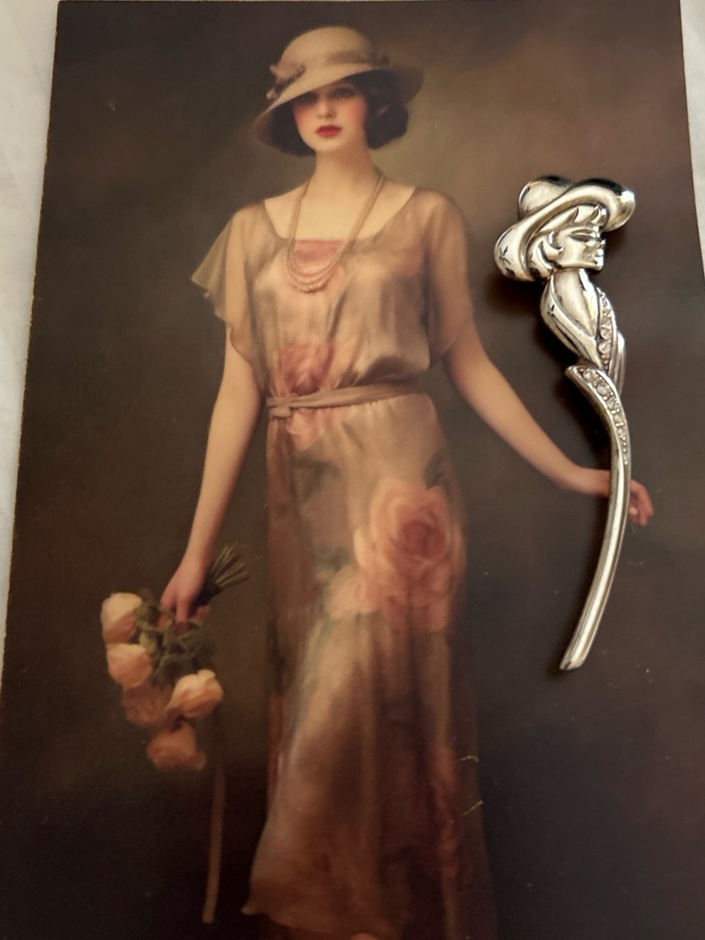 Elegant Silver-tone Floral Woman Brooch on Postcard